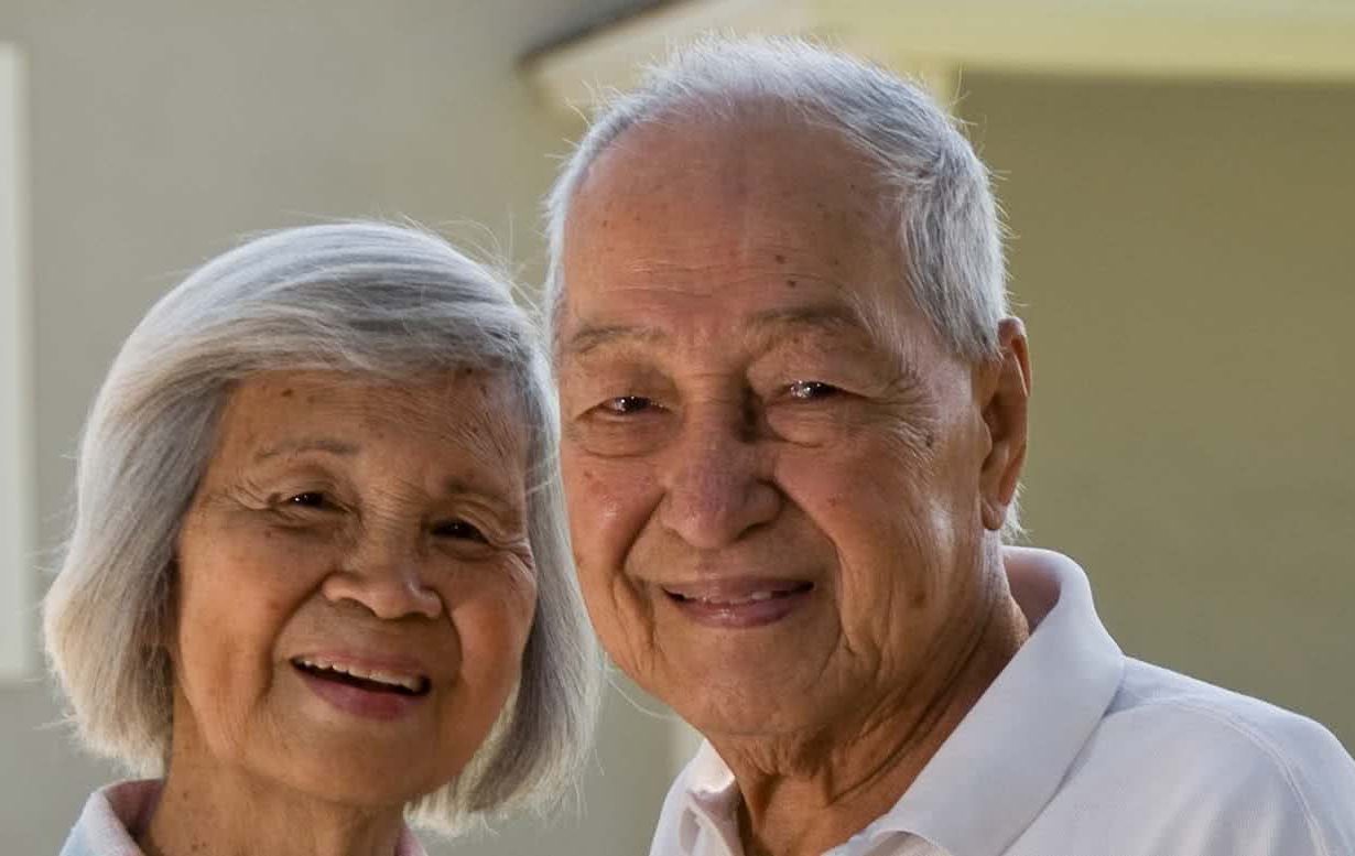 Elderly asian couple smiling
