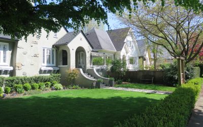 White heritage homes with tidy lawns